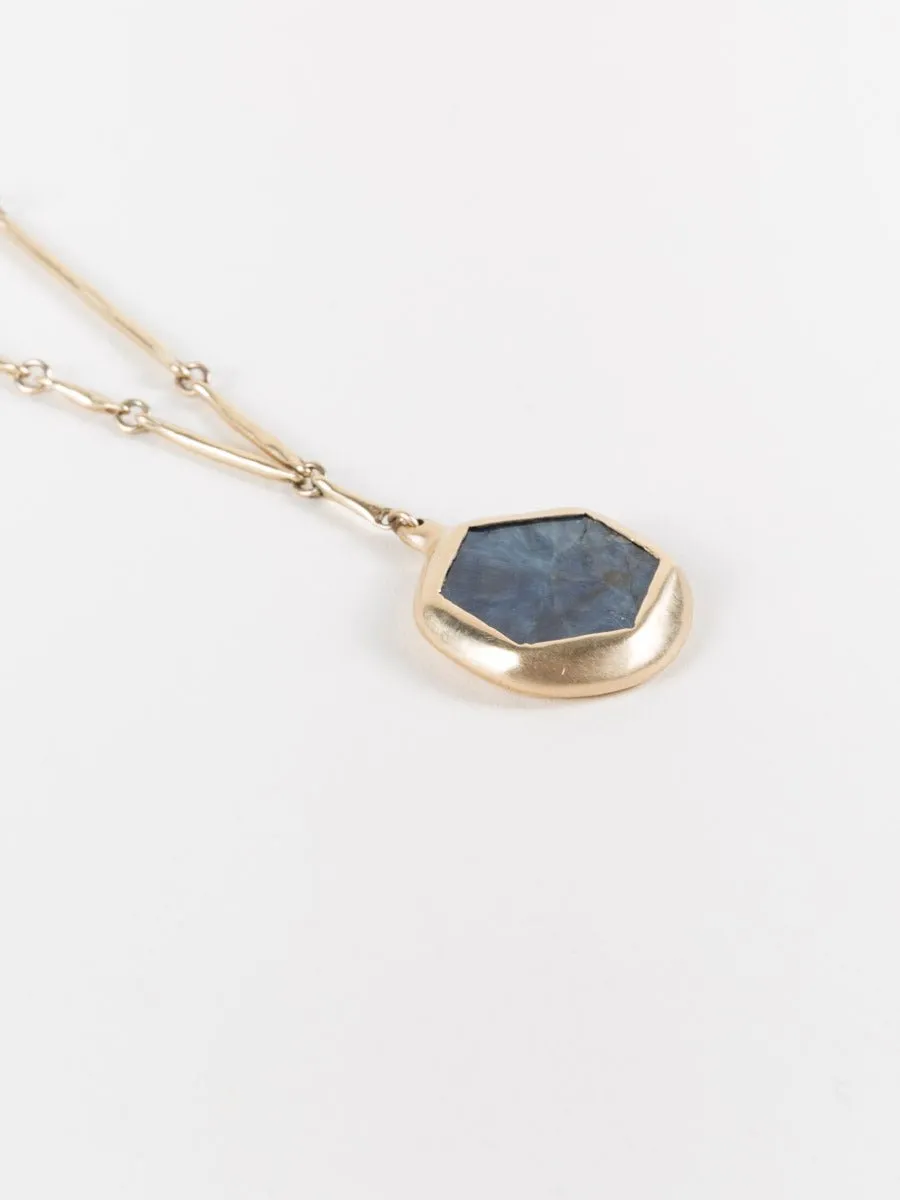 10k gold cast line sapphire pendant