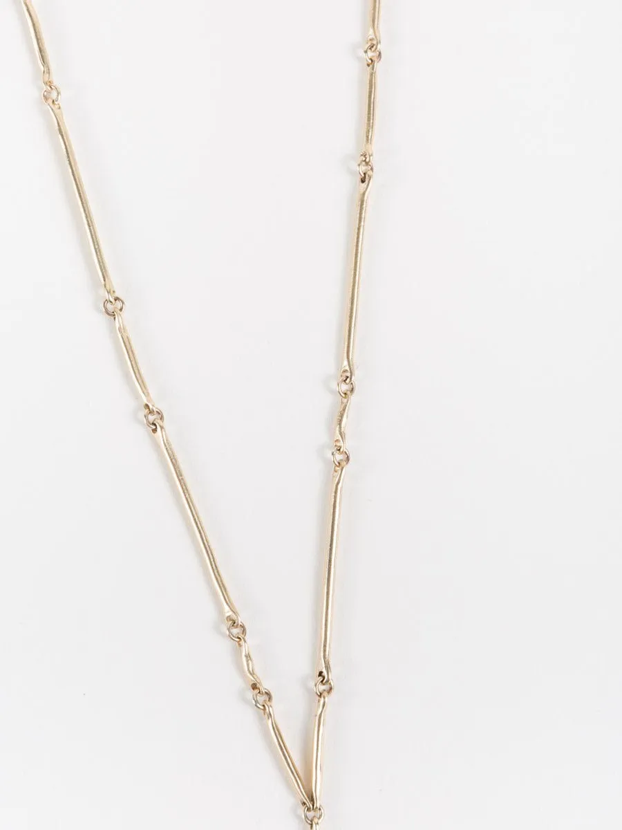 10k gold cast line sapphire pendant
