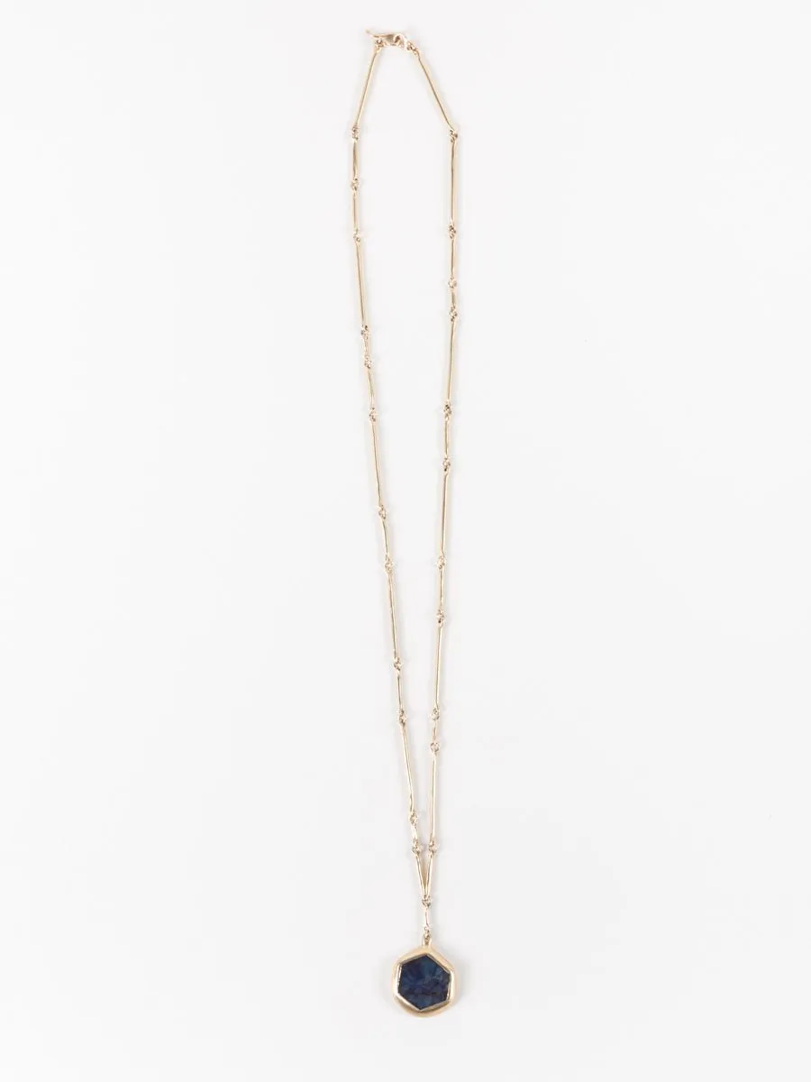 10k gold cast line sapphire pendant