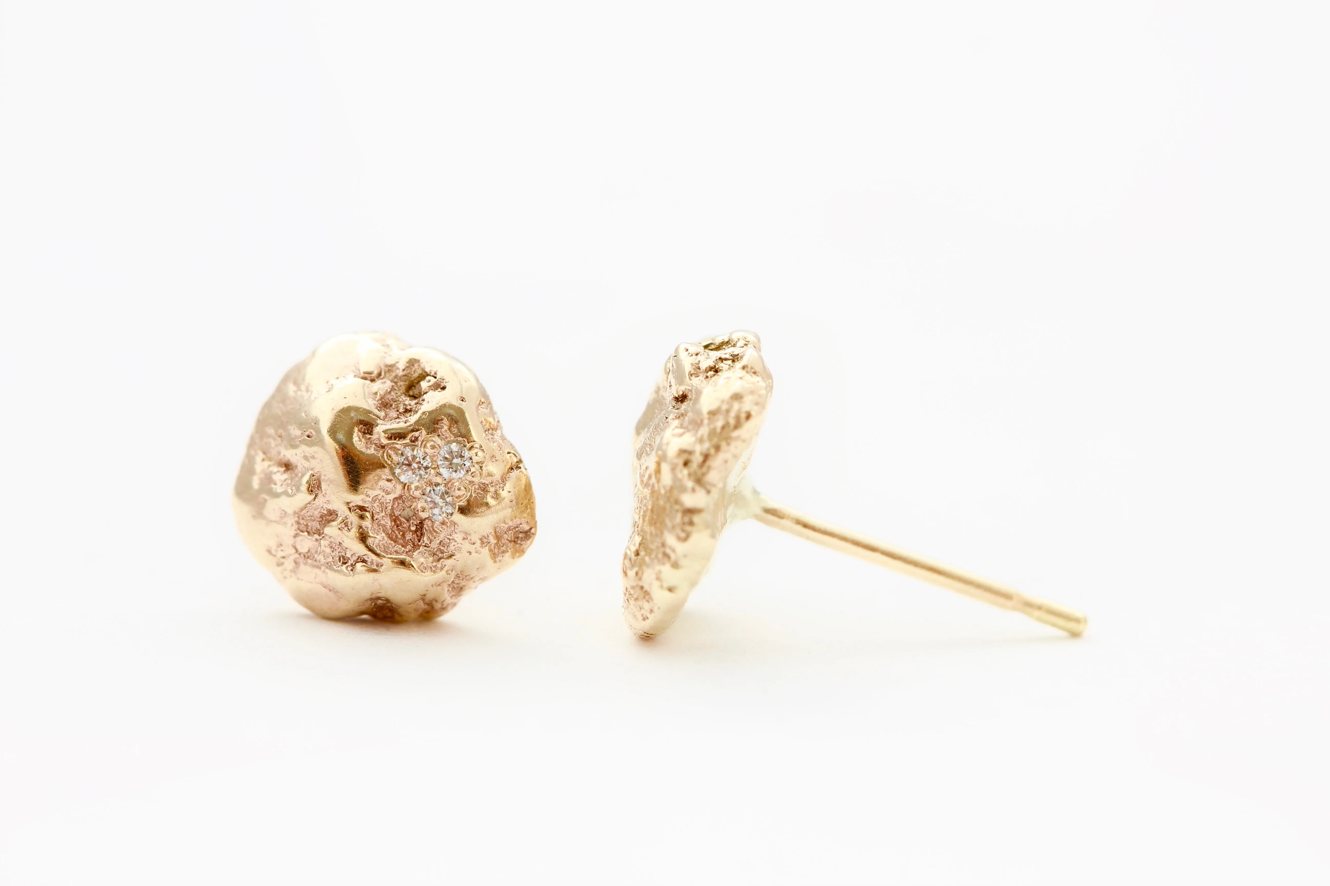 14k Yellow gold stud earrings with six white diamonds