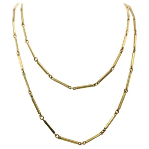 1980s 18 karat yellow gold long chain necklace.