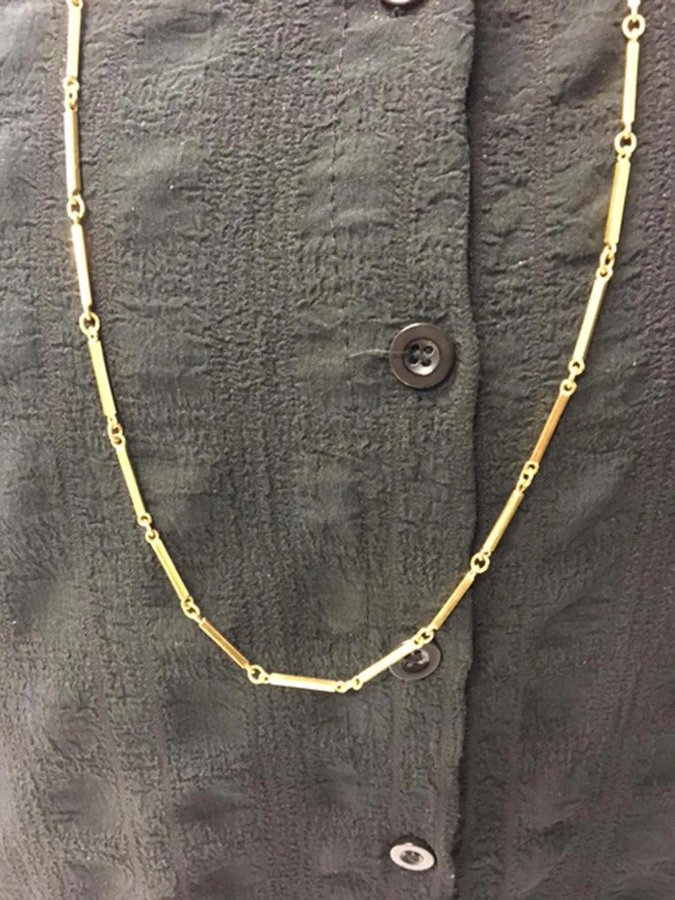 1980s 18 karat yellow gold long chain necklace.