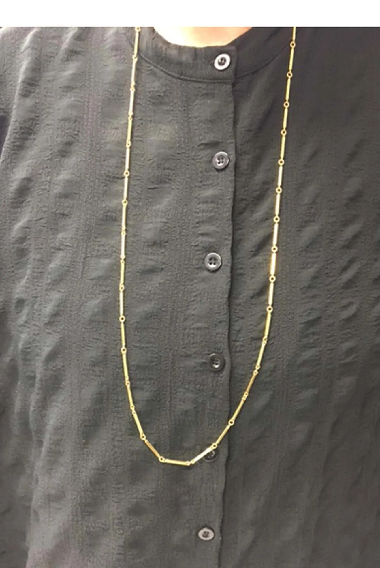 1980s 18 karat yellow gold long chain necklace.