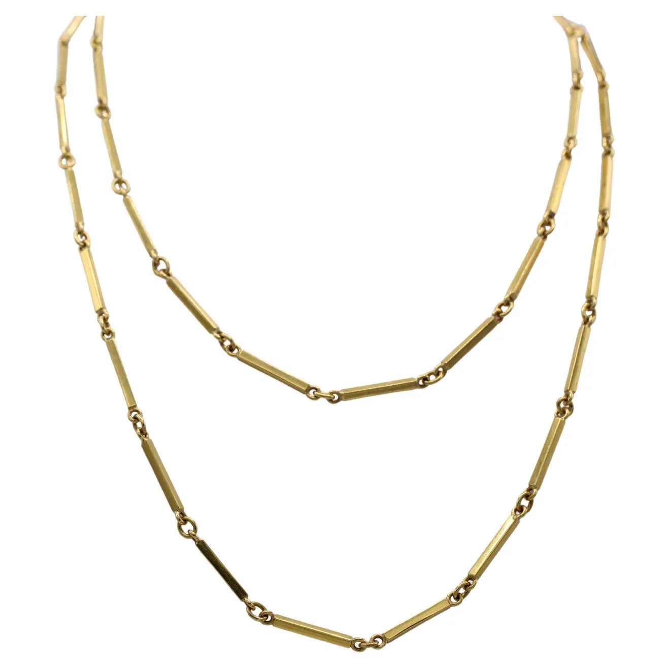 1980s 18 karat yellow gold long chain necklace.