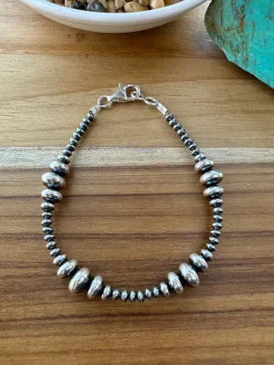 7.5" 3-8MM Navajo Style Rondell Pearl Bracelet