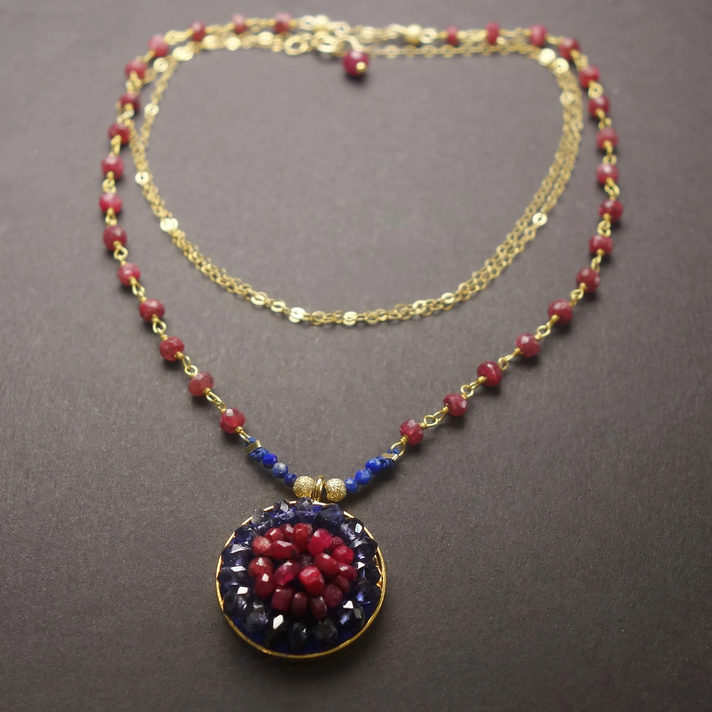 Axios: ruby, iolite, gold mosaic necklace