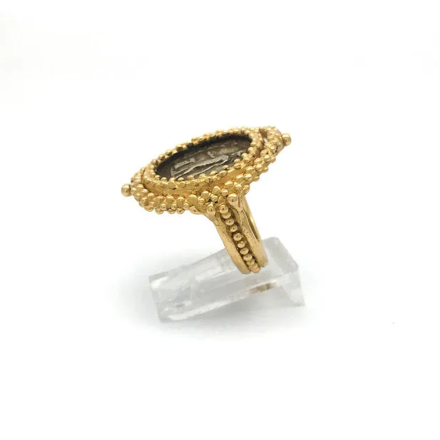 Caste granulation stirrup ring featuring an ancient Dentrius, Septimius Severus coin from 206 CE