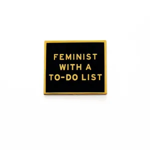 Feminist With a To-Do List Enamel Pin in Black and Gold