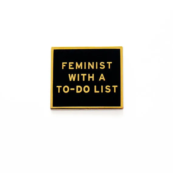 Feminist With a To-Do List Enamel Pin in Black and Gold