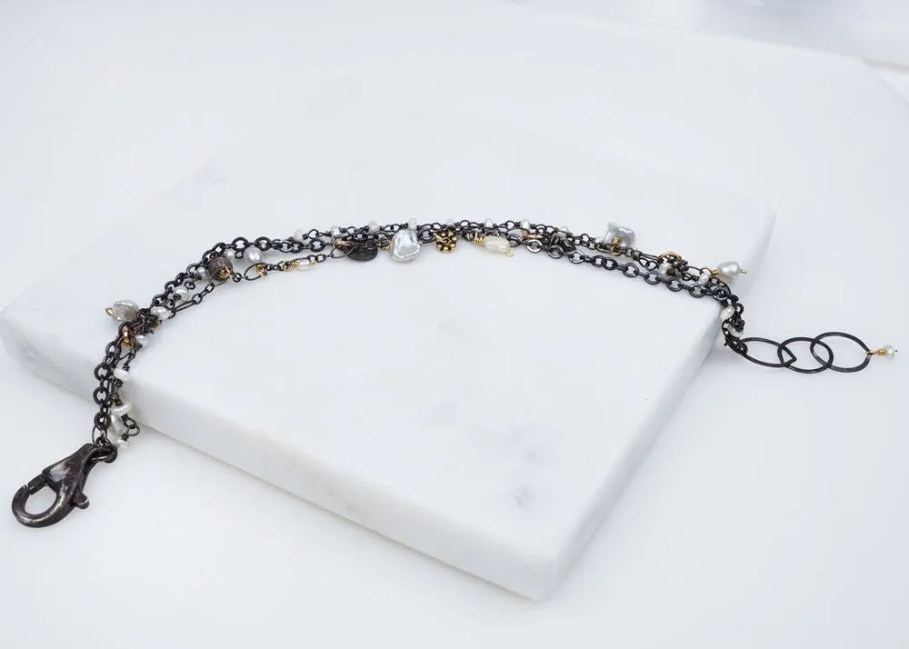 MULTI STRAND PEARL BRACELET