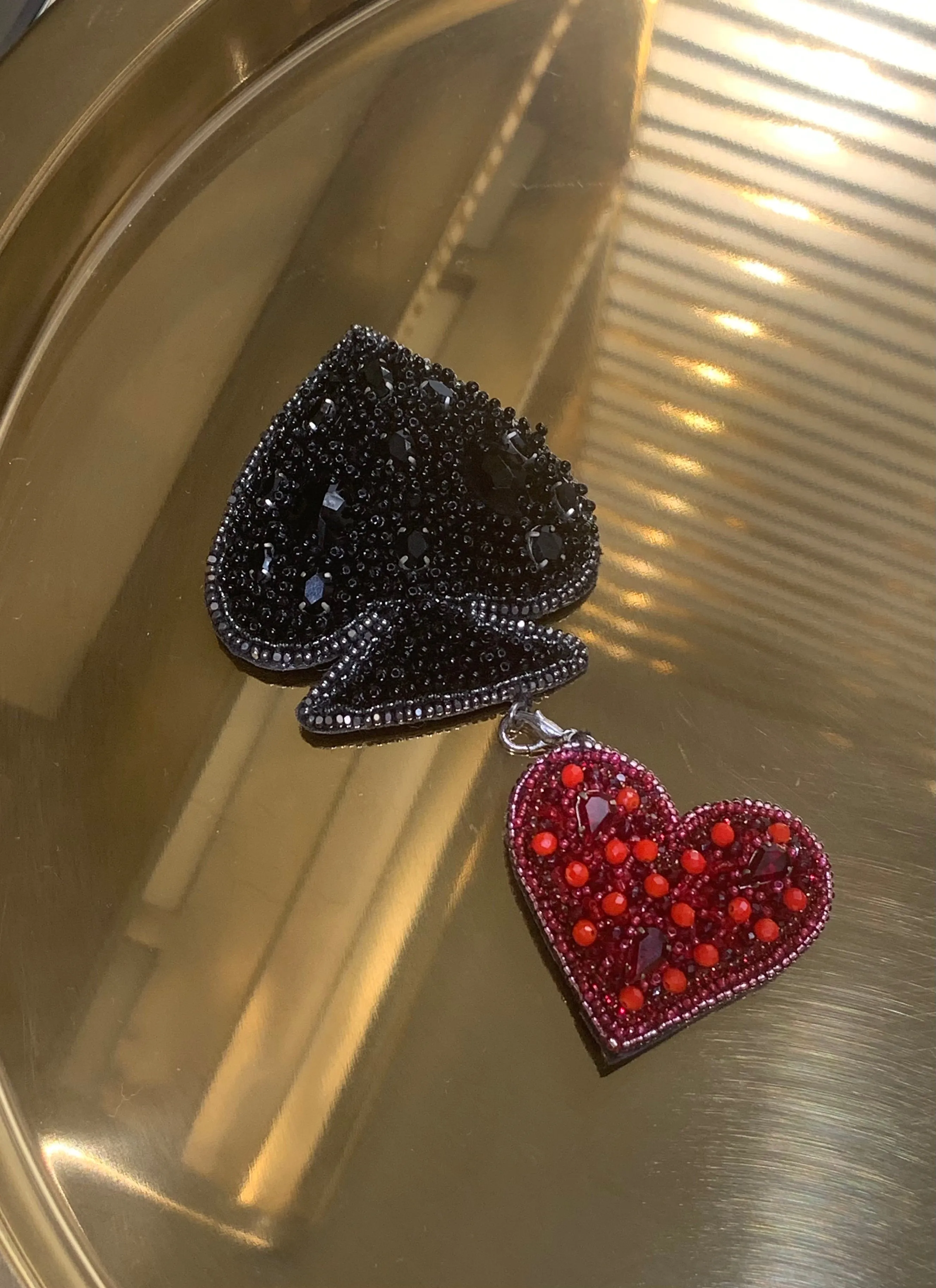 the magic card brooch