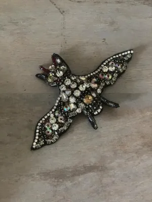 the night watcher brooch