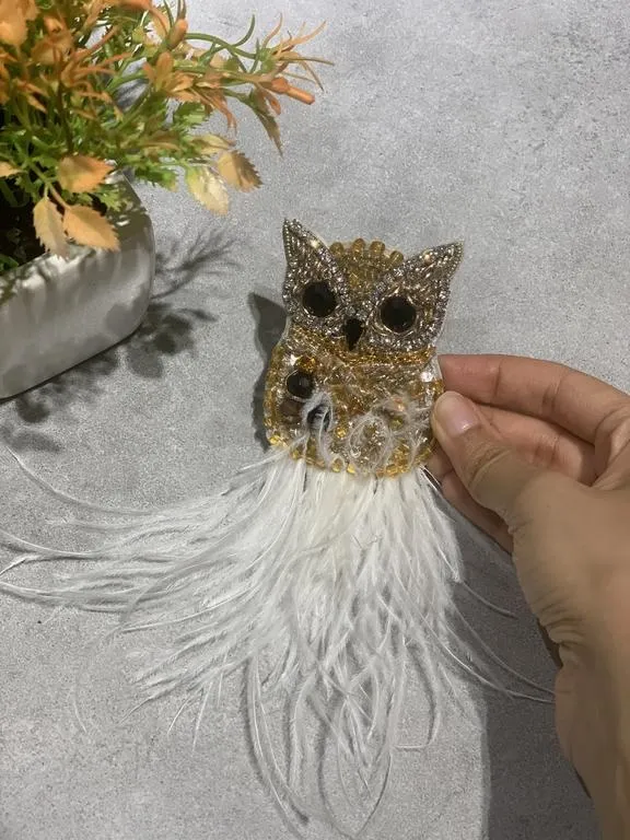 the owl night long brooch